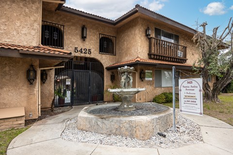 a fountain in front of a building